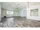 Inviting living space features a ceiling fan and stylish floors, perfect for relaxing and entertaining at 8426 Sw 114Th St, Ocala, FL 34481
