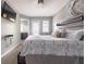 Bedroom with a mounted tv, comfortable bed and a view of the bathroom at 936 Calabria Ave, Davenport, FL 33897
