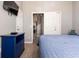 Comfortable bedroom with neutral colors, a tv and plenty of natural light at 936 Calabria Ave, Davenport, FL 33897