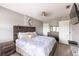 Bedroom featuring a stylish rustic bed and matching wood furniture at 936 Calabria Ave, Davenport, FL 33897