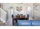 Comfortable dining area adjacent to living room and kitchen, ideal for Gathering meals and entertaining at 936 Calabria Ave, Davenport, FL 33897