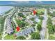 Aerial view pointing out the amenity center and available housing within the community at 104 Nautica Mile Dr, Clermont, FL 34711