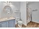 Stylish bathroom with vanity and shower and decorative shelving at 104 Nautica Mile Dr, Clermont, FL 34711