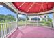Relax on this screened patio and enjoy views of the house and lush grounds at 104 Nautica Mile Dr, Clermont, FL 34711