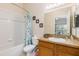 Clean bathroom includes a tub/shower combo, modern fixtures, and vanity with generous counter space at 110 Watling Way # 25204, Davenport, FL 33837