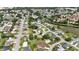Expansive aerial view of a residential neighborhood close to a lake and pond at 11412 Stamfield Dr, Orlando, FL 32821