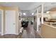 Inviting hallway with tile flooring leading to the living room and kitchen at 11412 Stamfield Dr, Orlando, FL 32821