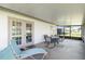 Covered lanai with comfortable lounge chair, ideal for relaxation with views at 11412 Stamfield Dr, Orlando, FL 32821