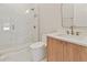Modern bathroom featuring marble tiled shower, toilet, vanity and contemporary finishes at 1217 Cloverlawn Ave, Orlando, FL 32806