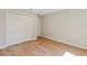 Cozy bedroom features hardwood floors and a closet at 1217 Cloverlawn Ave, Orlando, FL 32806