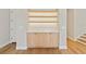 Custom cabinetry with lighted shelving and marble countertops, adding elegance and storage at 1217 Cloverlawn Ave, Orlando, FL 32806