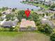 Aerial view of home with a pool and waterfront view at 1319 Johns Cove Ln, Oakland, FL 34787