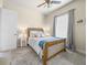 Comfortable bedroom featuring a cozy bed, side tables with lamps, and soft lighting at 1319 Johns Cove Ln, Oakland, FL 34787