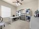 Bright office with shelves, desk, and natural light at 1319 Johns Cove Ln, Oakland, FL 34787
