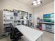 Bright office with shelves, desk, and ceiling fan at 1319 Johns Cove Ln, Oakland, FL 34787