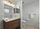 Bathroom with a modern vanity, beautiful lighting, and fixtures at 13917 Fairway Island Dr # 931, Orlando, FL 32837