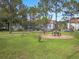 Well-maintained community green space with picnic tables and brick patio, perfect for outdoor enjoyment at 13917 Fairway Island Dr # 931, Orlando, FL 32837