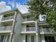 This is the exterior of the condominium building at 13917 Fairway Island Dr # 931, Orlando, FL 32837