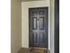 Welcoming front door with a classic design and a 'Welcome' mat, inviting you to step inside at 13917 Fairway Island Dr # 931, Orlando, FL 32837