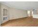 Bright living space with wood flooring and built-in shelving niches at 13917 Fairway Island Dr # 931, Orlando, FL 32837