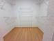 Spacious walk-in closet featuring shelving and ample space for storage at 13917 Fairway Island Dr # 931, Orlando, FL 32837