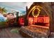 Charming themed bedroom boasting a unique tiki hut bed frame and vibrant wall mural at 1403 Rolling Fairway Dr, Davenport, FL 33896