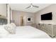 Cozy bedroom featuring neutral colors, a comfortable bed, and stylish furnishings for a relaxing atmosphere at 1403 Rolling Fairway Dr, Davenport, FL 33896