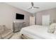 Relaxing bedroom featuring a comfy bed, TV, and lots of room to move around at 1403 Rolling Fairway Dr, Davenport, FL 33896