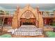 Themed bedroom with a creative tiki hut design, featuring detailed woodwork and décor at 1403 Rolling Fairway Dr, Davenport, FL 33896