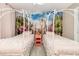 Charming ' bedroom featuring twin beds with princess carriage headboards and a colorful Disney themed mural at 1403 Rolling Fairway Dr, Davenport, FL 33896