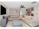 Upstairs living room is decorated with fun movie decor and comfortable couches at 1403 Rolling Fairway Dr, Davenport, FL 33896