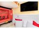 Fire station-themed play area with TV, toy fire truck and accessories for imaginative play at 1403 Rolling Fairway Dr, Davenport, FL 33896