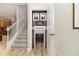 Unique staircase with a hidden 'Fire Station' themed room accessed through a small doorway at 1403 Rolling Fairway Dr, Davenport, FL 33896