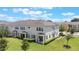 Aerial view of the home highlighting its prime location, manicured lawn, and community surroundings at 15241 Sunrise Grove Ct, Winter Garden, FL 34787