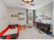 Delightful room with car bed and toy storage, perfect for imaginative play at 15241 Sunrise Grove Ct, Winter Garden, FL 34787