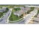 Aerial view of townhomes in a beautiful community with sidewalks and pristine lawns at 15241 Sunrise Grove Ct, Winter Garden, FL 34787