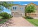 Traditional two-story home boasting an expansive driveway and manicured landscaping at 15241 Sunrise Grove Ct, Winter Garden, FL 34787