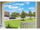 Inviting front yard view showcasing the lush lawn and landscaping at 15241 Sunrise Grove Ct, Winter Garden, FL 34787