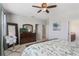 Spacious main bedroom with ensuite bathroom and comfortable décor at 15241 Sunrise Grove Ct, Winter Garden, FL 34787