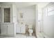 Bathroom with white tiled shower and tile flooring at 1601 Randolph St, Deltona, FL 32725