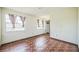 Bright bedroom with tile floors, natural light, and neutral walls at 1601 Randolph St, Deltona, FL 32725
