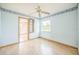 Bedroom with hardwood floors, and nautical-themed wallpaper at 1601 Randolph St, Deltona, FL 32725