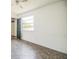 Bedroom featuring hardwood floors and ample natural light at 1601 Randolph St, Deltona, FL 32725