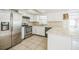 Functional kitchen equipped with essential appliances and ample countertop space at 1601 Randolph St, Deltona, FL 32725