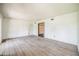Spacious living room with neutral carpet and lots of natural light at 1601 Randolph St, Deltona, FL 32725