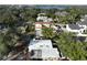 Aerial view showcases the neighborhood's mature trees and proximity to the lake at 1840 Laurel Rd, Winter Park, FL 32789