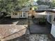 Backyard featuring stone pavers, wood deck and detached structure at 1840 Laurel Rd, Winter Park, FL 32789
