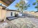 Backyard with a stone paver area, wood deck, and detached structure at 1840 Laurel Rd, Winter Park, FL 32789