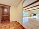 Inviting home foyer with terra cotta tile flooring and an open view into the expansive living area at 1840 Laurel Rd, Winter Park, FL 32789