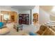 Inviting living room featuring an open layout that flows seamlessly into the dining area at 1933 Darlin Cir, Orlando, FL 32820